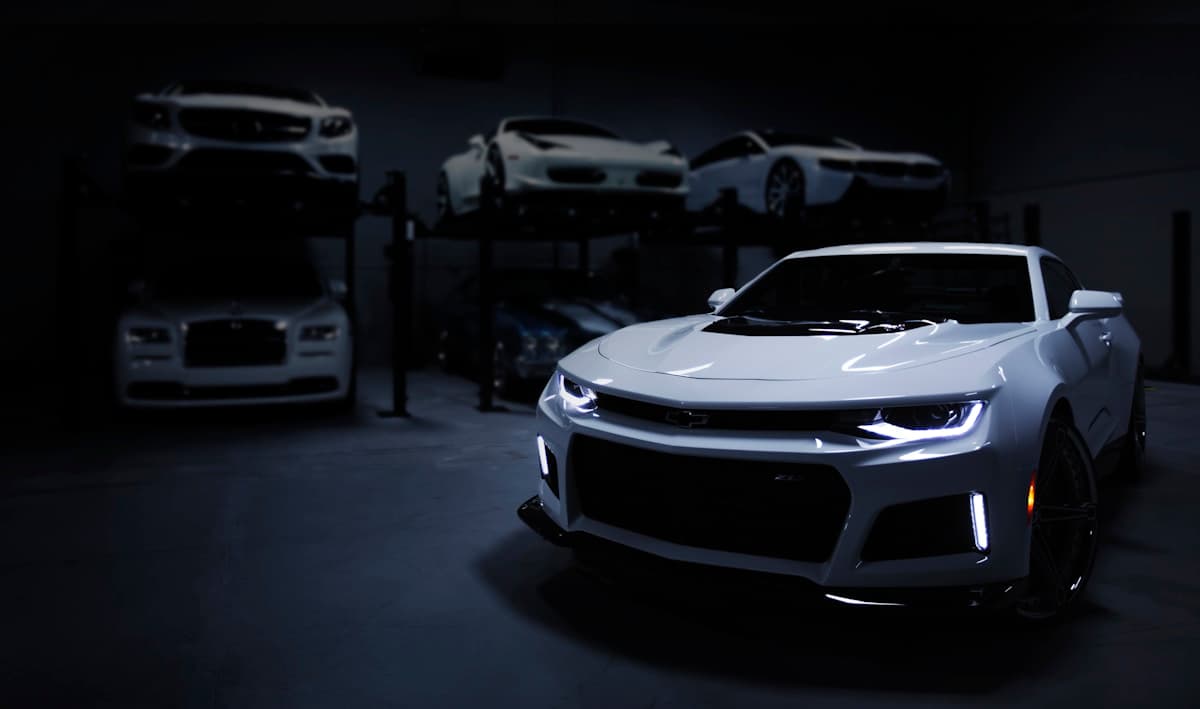 Performance car in a professional automotive workshop